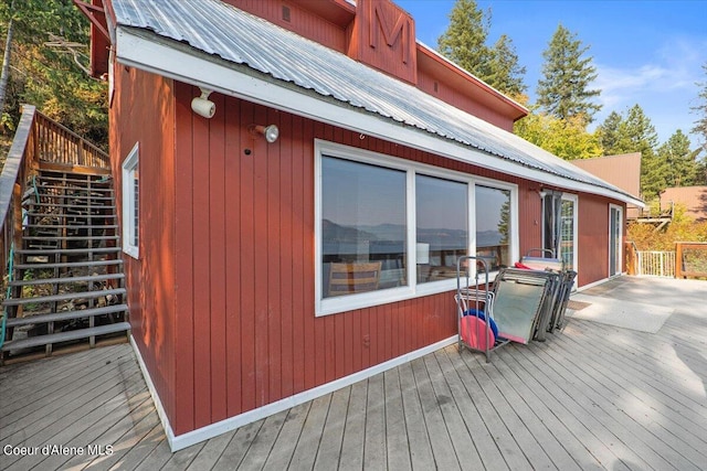 wooden deck featuring stairway