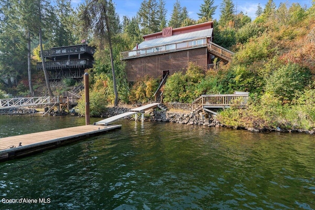 view of dock with a water view and stairs