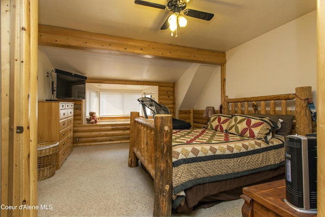 bedroom with log walls, beam ceiling, carpet floors, and ceiling fan