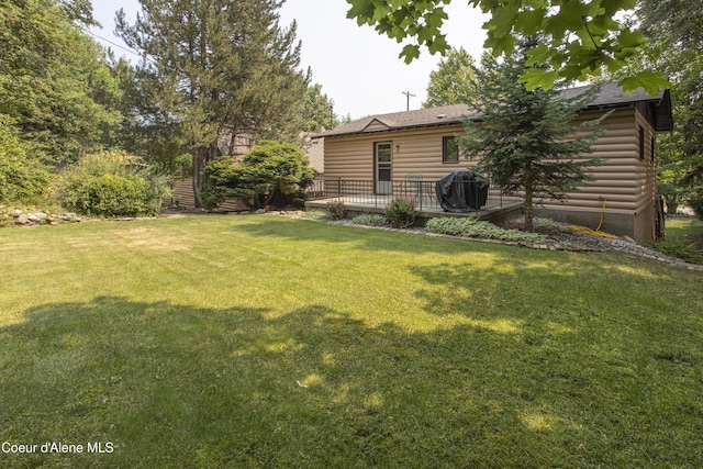 view of yard featuring a deck