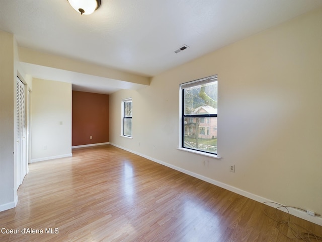 empty room featuring light hardwood / wood-style floors