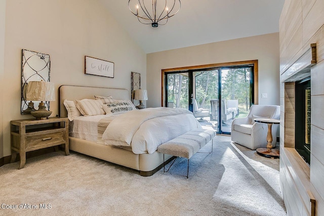 L3B10 N Walden Loop, Rathdrum, ID 83858 - bedroom with light carpet, a notable chandelier, high vaulted ceiling, and access to outside