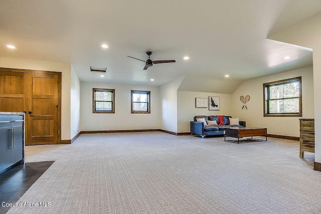 L3B10 N Walden Loop, Rathdrum, ID 83858 - living room with vaulted ceiling, ceiling fan, plenty of natural light, and carpet flooring