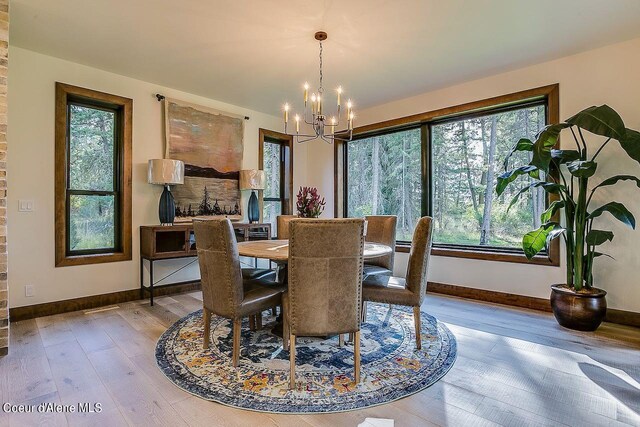 L3B10 N Walden Loop, Rathdrum, ID 83858 - dining space with light wood-type flooring and a chandelier