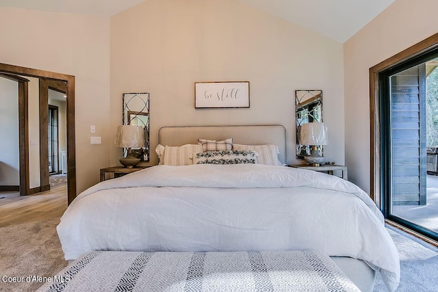 L3B10 N Walden Loop, Rathdrum, ID 83858 - bedroom featuring vaulted ceiling, multiple windows, and access to outside