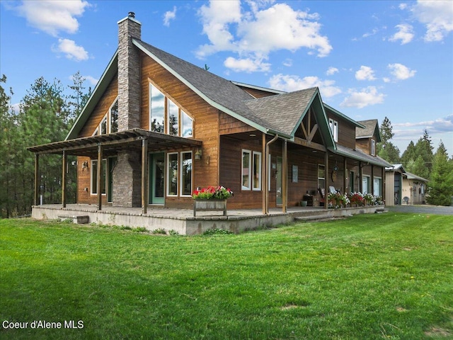 exterior space with a lawn and covered porch