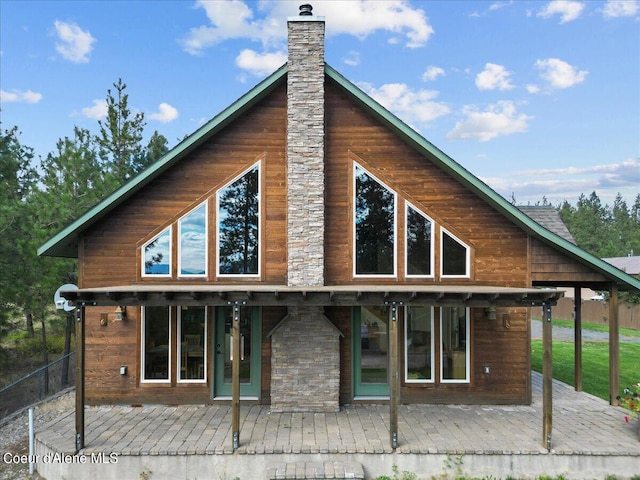 rear view of house featuring a patio