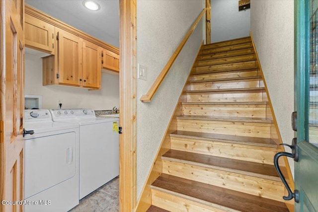 interior space with separate washer and dryer and hardwood / wood-style flooring