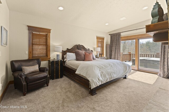 bedroom with light carpet, access to exterior, and recessed lighting