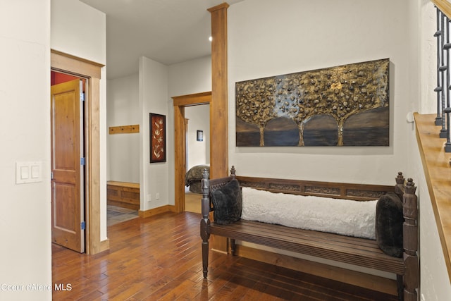 interior space featuring hardwood / wood-style floors and baseboards