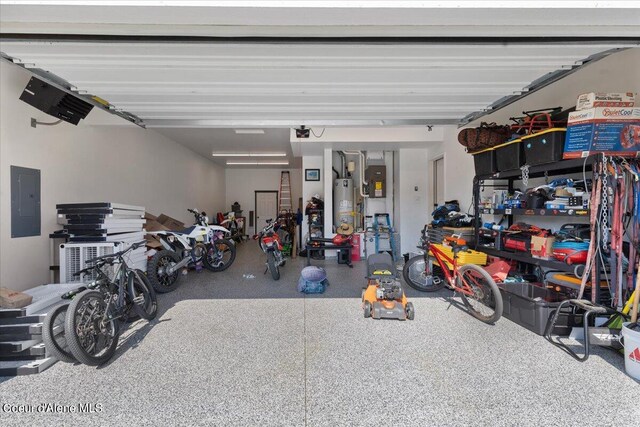 garage featuring gas water heater and electric panel