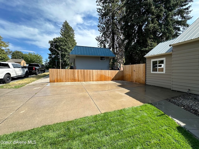 view of home's exterior with a lawn