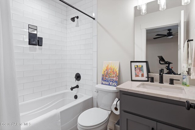 full bathroom featuring vanity, ceiling fan, toilet, and shower / bath combo