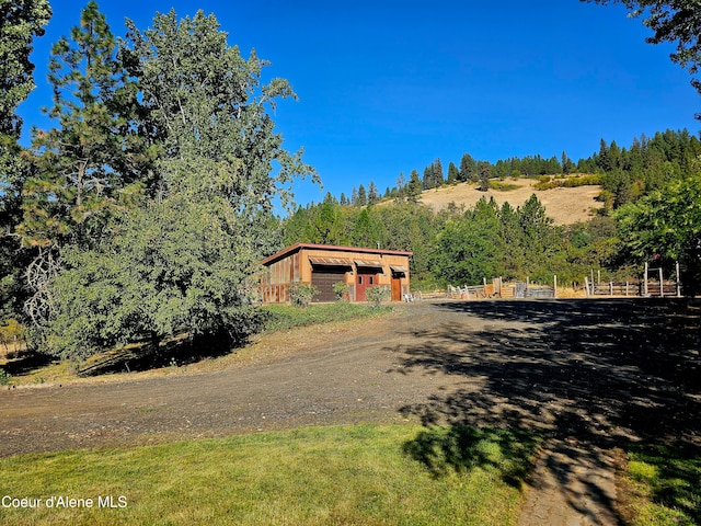 exterior space with a rural view