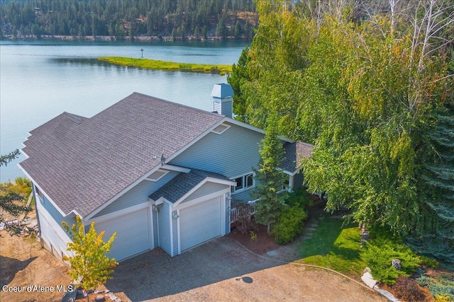 drone / aerial view with a water view