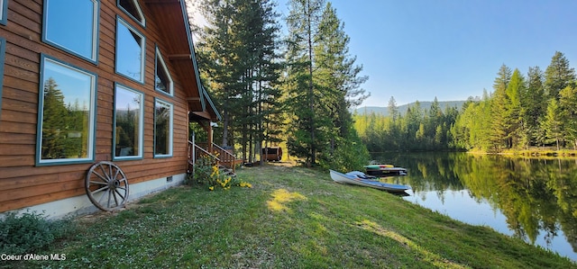 view of yard with a water view