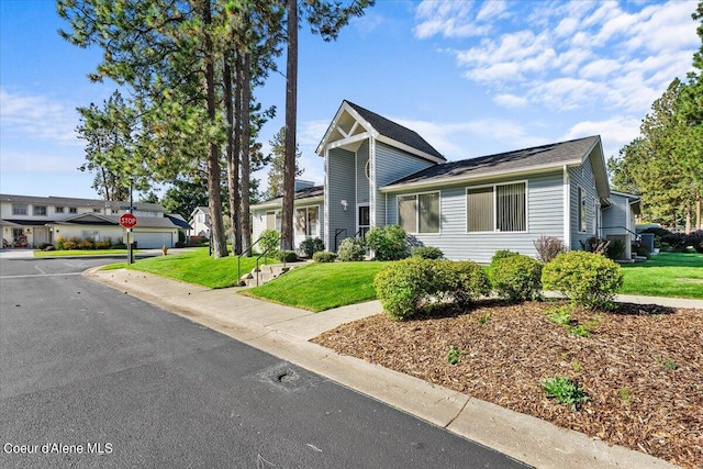 view of front of property with a front lawn