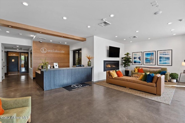 living room featuring wooden walls