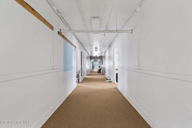 hallway with light carpet