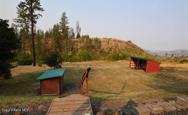 169 Westfall Ln, Kamiah, ID 83536 - view of yard featuring an outdoor structure and a mountain view