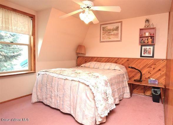 169 Westfall Ln, Kamiah, ID 83536 - carpeted bedroom with ceiling fan and lofted ceiling