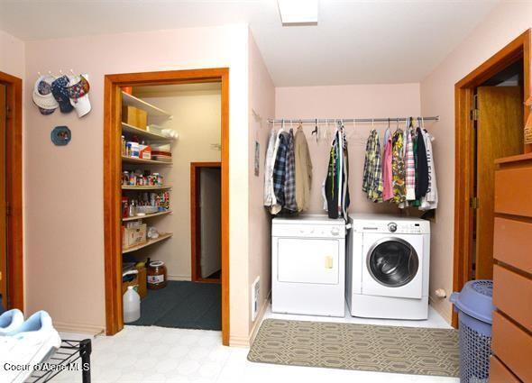 169 Westfall Ln, Kamiah, ID 83536 - clothes washing area featuring washer and dryer, laundry area, and visible vents