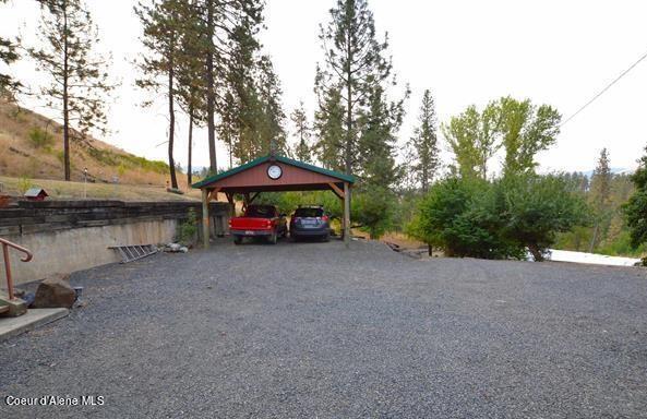 169 Westfall Ln, Kamiah, ID 83536 - view of vehicle parking featuring a detached carport and gravel driveway