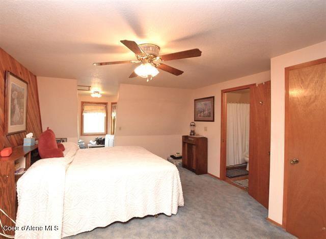 169 Westfall Ln, Kamiah, ID 83536 - bedroom featuring ceiling fan and carpet