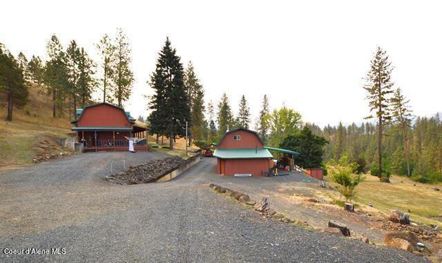 169 Westfall Ln, Kamiah, ID 83536 - view of front of home with a barn and an outbuilding