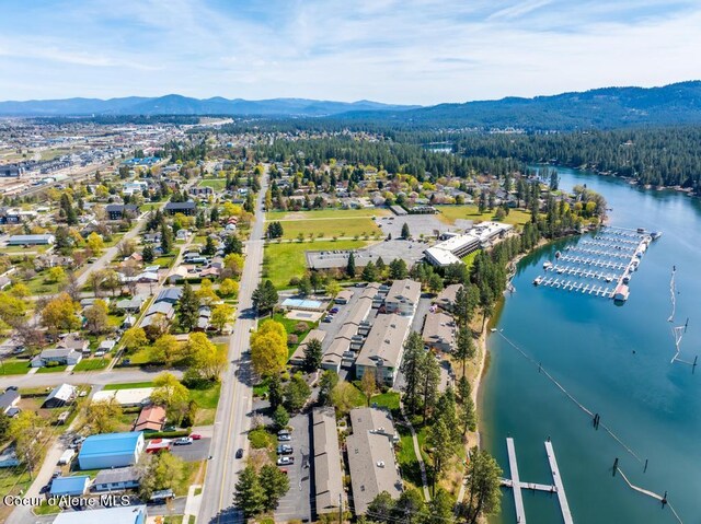 bird's eye view with a water and mountain view