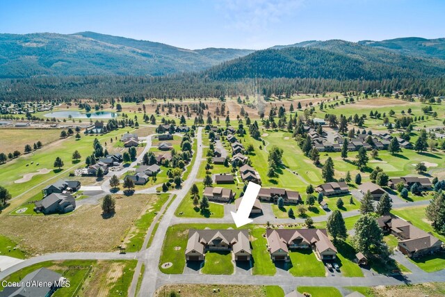 drone / aerial view featuring a mountain view