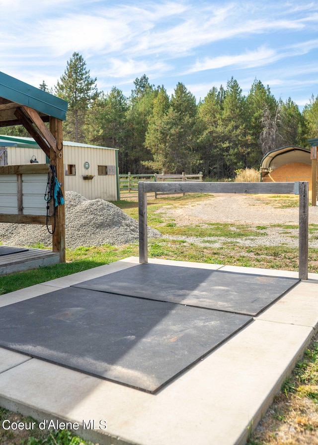 exterior space featuring a shed