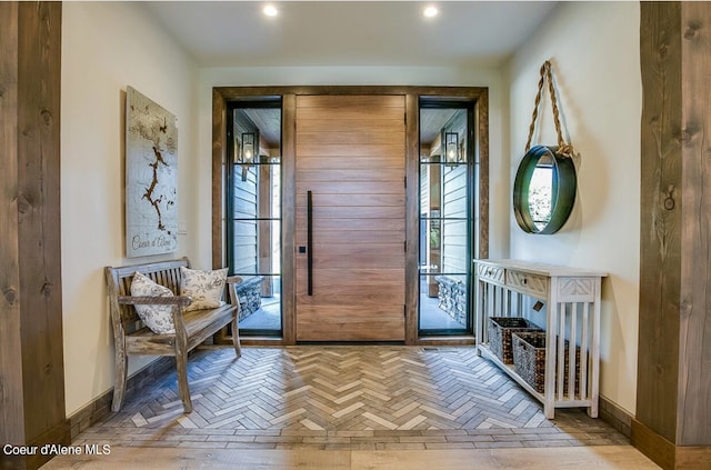 foyer entrance featuring plenty of natural light and parquet floors