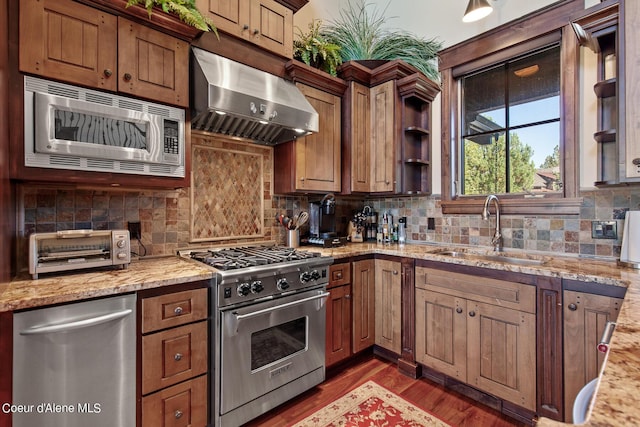 17023 S Citrine Dr, Coeur Dalene, ID 83814 - kitchen with a sink, open shelves, appliances with stainless steel finishes, exhaust hood, and dark wood-style flooring