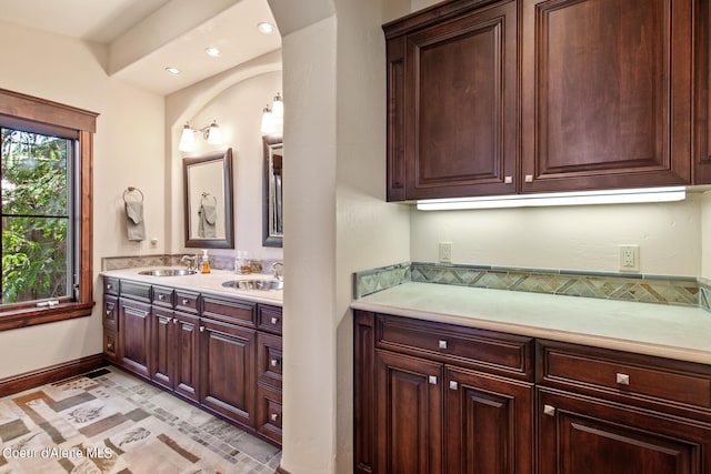 17023 S Citrine Dr, Coeur Dalene, ID 83814 - bathroom with double vanity, a sink, baseboards, and recessed lighting