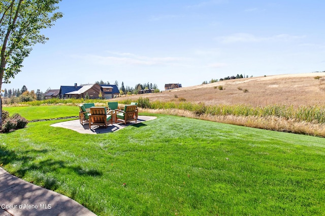 17023 S Citrine Dr, Coeur Dalene, ID 83814 - view of yard featuring a patio