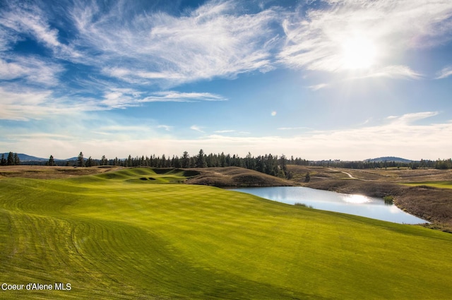 17023 S Citrine Dr, Coeur Dalene, ID 83814 - view of home's community with a lawn, a water view, and golf course view