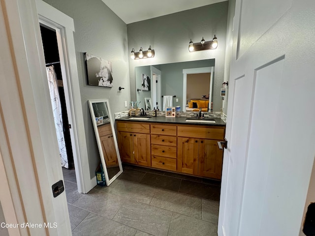 bathroom featuring vanity and tile patterned floors