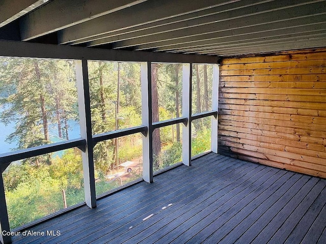 unfurnished sunroom with a healthy amount of sunlight