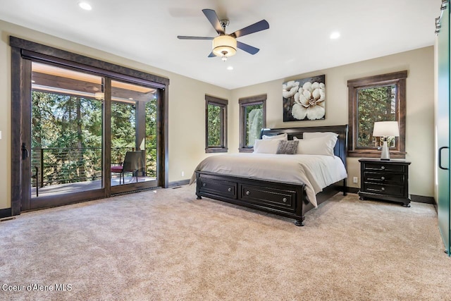 carpeted bedroom featuring access to outside and ceiling fan