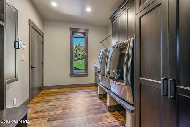 mudroom with dark wood-type flooring