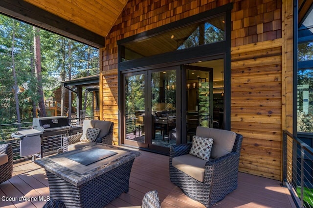 deck featuring area for grilling and french doors