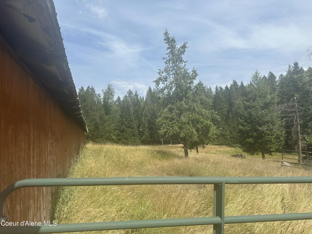 view of yard featuring a rural view