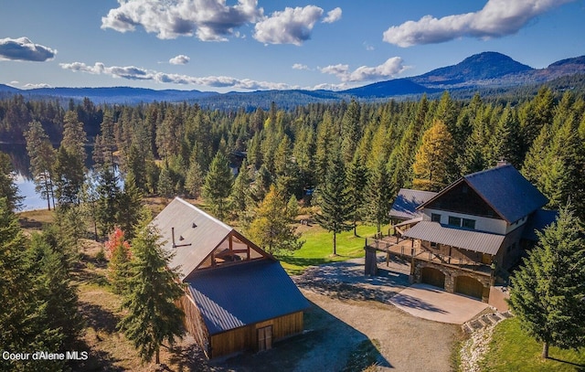 drone / aerial view featuring a mountain view