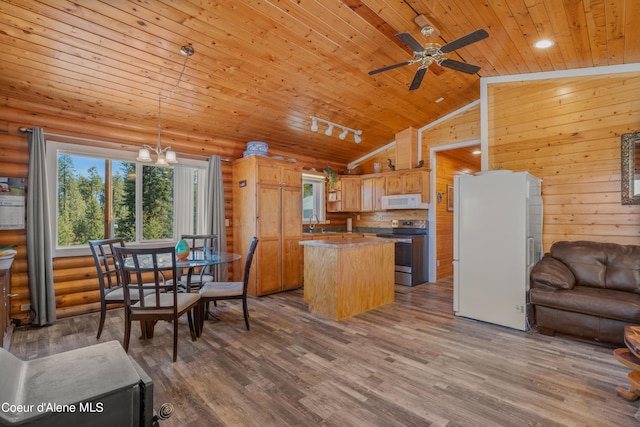 kitchen with hanging light fixtures, white appliances, a center island, wooden ceiling, and hardwood / wood-style floors