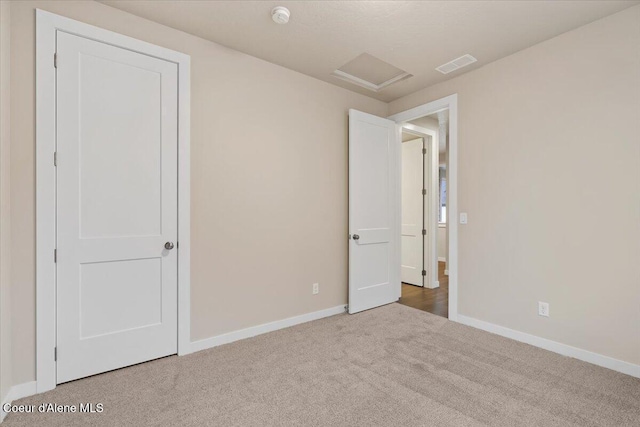 unfurnished bedroom featuring carpet