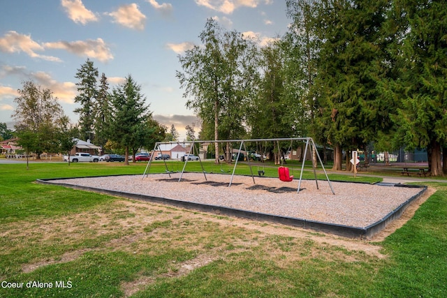 community play area with a lawn