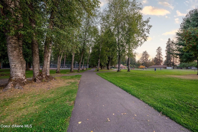 surrounding community featuring a lawn