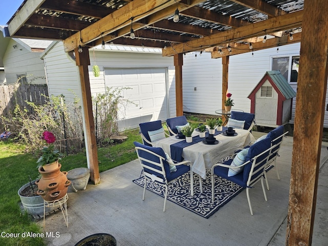 3314/3316 N 5th St, Coeur Dalene, ID 83815 - view of patio / terrace featuring a pergola and outdoor dining space