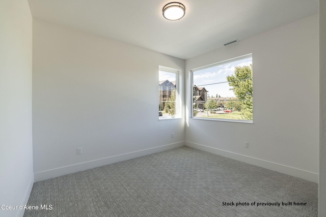 empty room featuring carpet